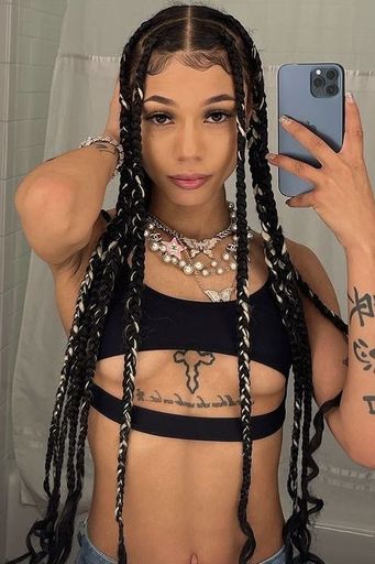 Coi Leray's tinsel braids